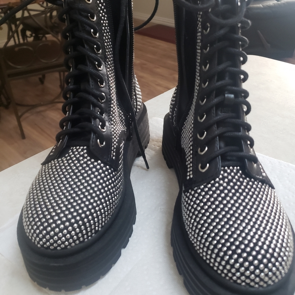 Ladies Combat Boots. They are black with silver studs all over.  Size 6!